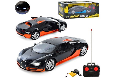 Машина M 4915 (9шт) 1:12, р/к, акум, 33см, світло,резин.кол,відкр.дв,2 кольор, в кор-ці,46,5-18-19см