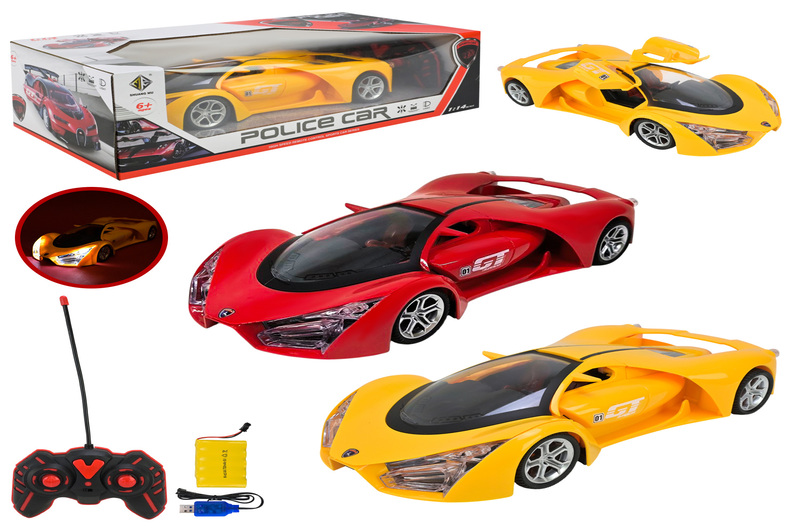 Машина р/к арт. 565-K29 (18шт/2) 2 кольори акум.,світло фар,відкр.двері,у короб. 40,8*20*12,5см